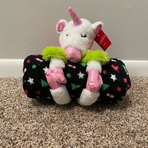 Unicorn stuffed animal with blanket